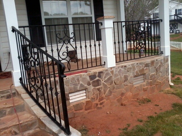 mediterranean black wrought iron vertical railing with accent