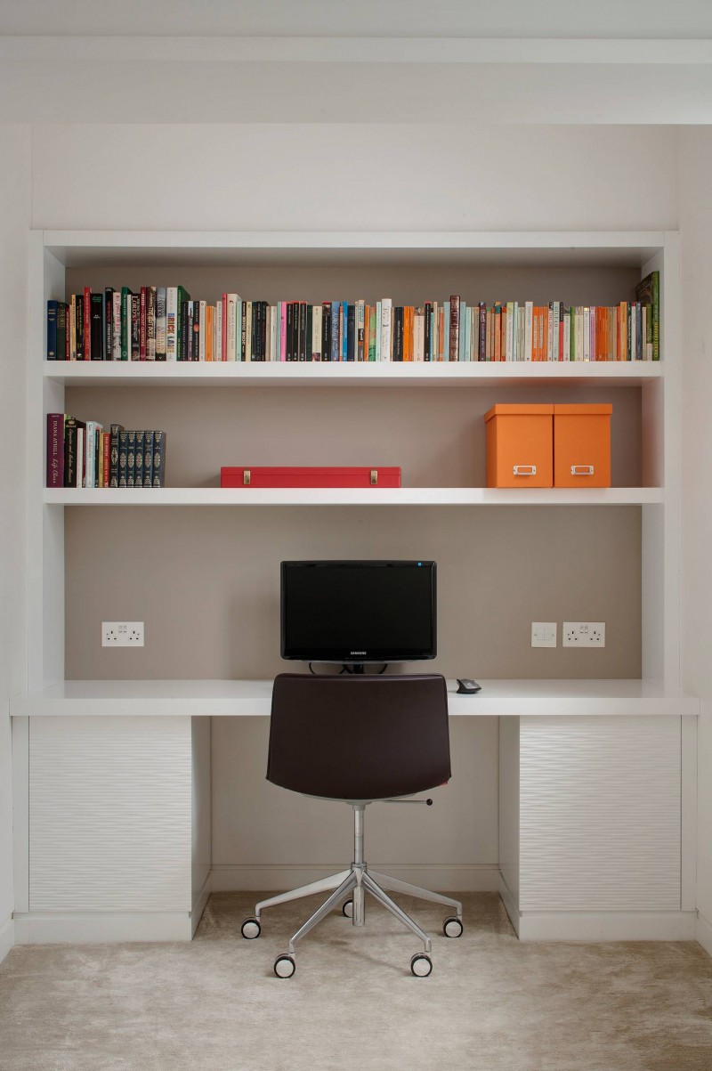minimalist built in bookshelves white cabinet contrasted grey wall custom office chair