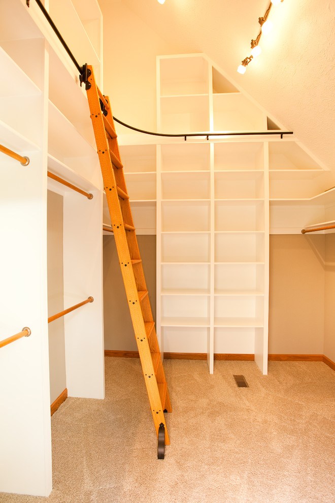 bottom to ceiling white melamine walk in closet idea with movable wooden ladder with railing system support