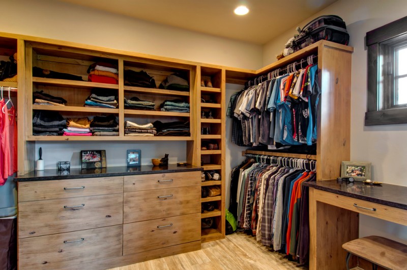 modern rustic walk in closet idea with cool shabby finishing and black & solid top for cabinetry