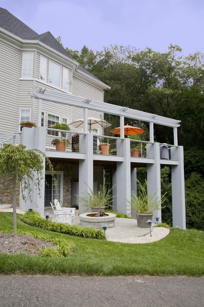 outdoor metal railing with flower design idea chairs big pots flowers pillars windows
