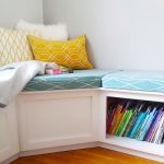 l shaped bench with storage blue cushion book storage yellow patterned pillow