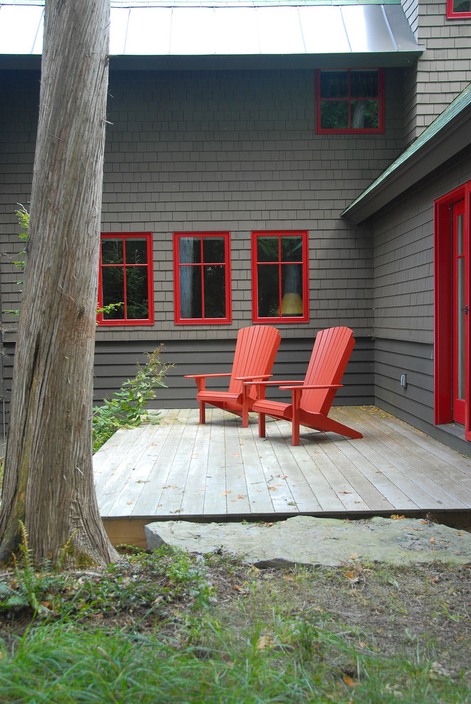 best deck paint grass red chairs windows dark walls rustic deck