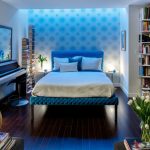 Blue Bed Frame With Headboard White Bedding Idea Dark Toned Woodboard Floors Blue Polka Dots Wallpaper White Walls White Book Rack
