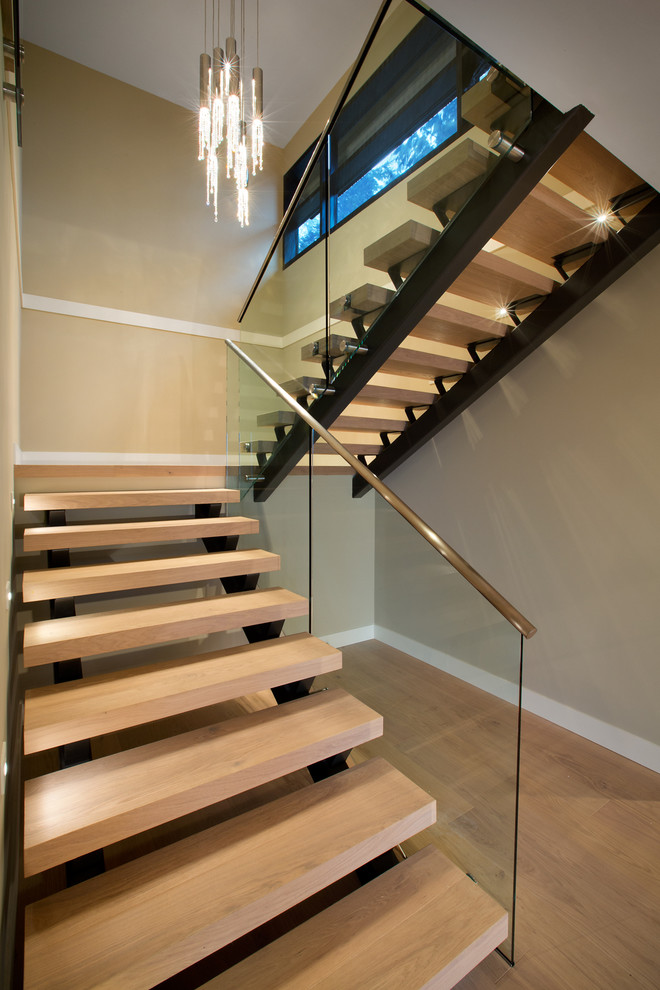 metal stair stringers glass pendant hardwood floors staircase contemporary design