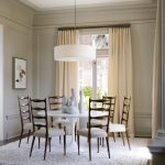 Contemporary Dining Room With Modern French Dining Room Supported With Wood Back And White Fabric White Square Area Rug White Round Top Table White Pendant Lamp Grey Walls Light Yellow Draperies