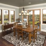 Trendy Dining Room With Gray Walls And Dark Hardwood Floors Wooden Dining Room Table Set And Furniture Pendant Lamp Ceramic Vases In Gray And White
