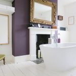 Purple Accent Walls Freestanding Tub Mirrors With Simple And Classic Frames Window White Walls Chair Tub Faucet White Floor Tile