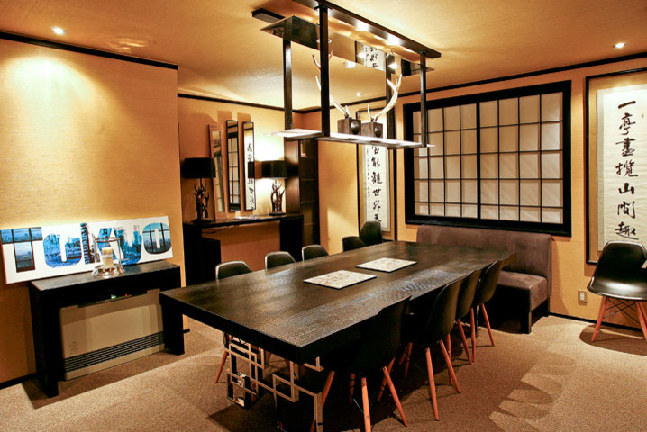 asian dining table black dining table unique legs lighting black chairs black framed window grey couch decoration black table lamps