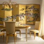 Chinese Home Decorations Golden Folded Screen Gold Chandelier Dining Table And Chairs Beige Walls Transparent Window Curtains