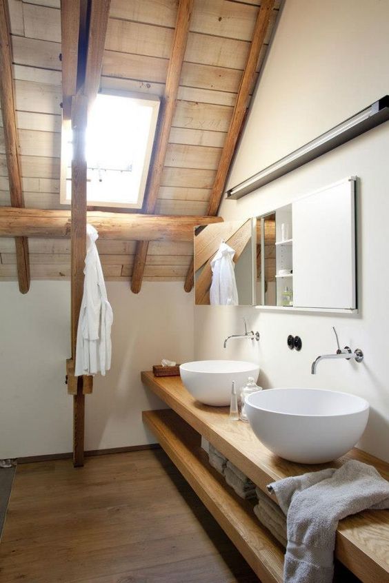 bathroom, wooden floor, wooden floating shelves, white sink, white wall, mirror, wooden ceiling, wooden beams