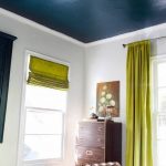 Bedroom, White Walls, White Bedding, Metal Platform, Lime Curtain, Dark Green Ceiling, White Bulbs Chandelier