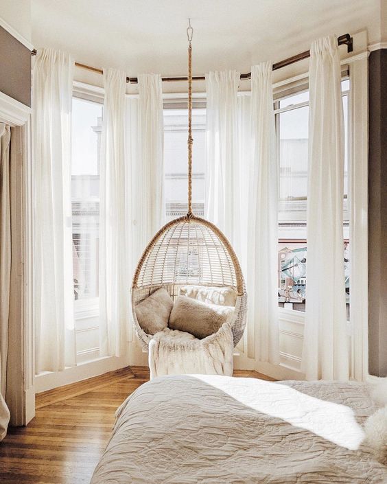 bedroom, wooden floor, white curtain, alcove round space with glass windows, hanging chair