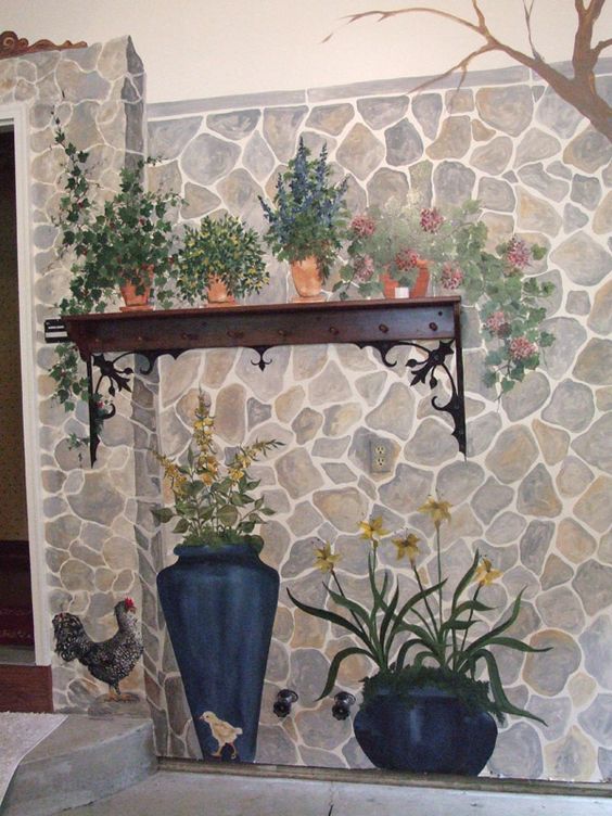 wall with painted stone, plants on pots, hen, chicken, and real wooden floating shelves