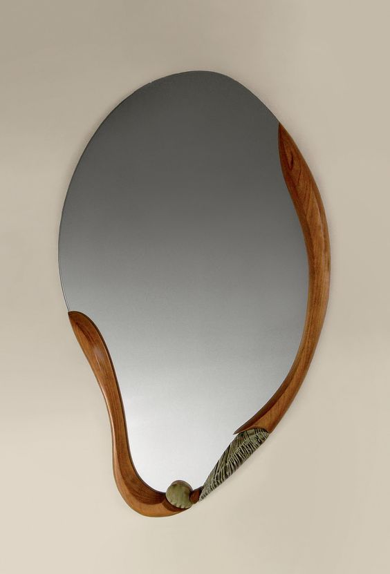 asymmetric mirror with wooden frame under the mirror only
