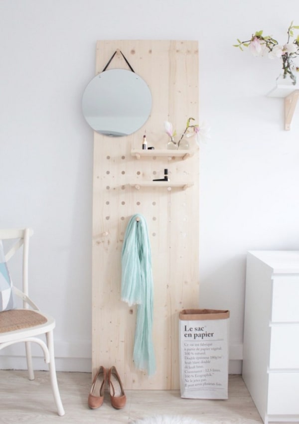 plywood, pegboard with shelves, mirror, hook