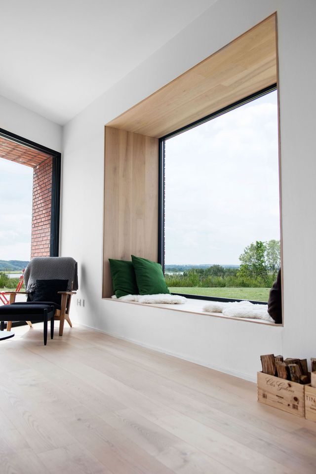 window seat, wooden layered on the seating, wall , ceiling, white wall