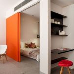 Bedroom, Grey Wall, White Wall, Black Floating Study Table, Red Stool, Orange Door, White Chair
