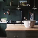 Kitchen, Herringbone Brown Floor Tiles, Dark Green Wall, Dark Green Cabinet, White Bottom Cabinet, Grey Island With Wooden Top, Pendants