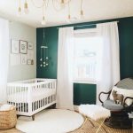 Nursery, Green Wall, White Wall, White Curtain, Rattan Rug, White Wooden Crib, Rattan Basket, Rattan Chairs With Stool With Fur Cushion