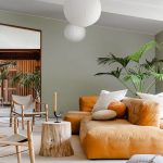 Living Room, Seamless Beige Floor, Rattan Rug, Wooden Chair With Grey Cushion, Orange Sofa, Wooden Slab Side Table, White Round Pendant
