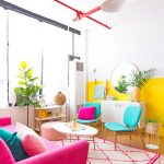 Living Room, Wooden Floor, White Pink Patterned, White Wall, Red Pipe, Yellow White Wall, Turquoise Chair, White Coffee Table, Shocking Pink Sofa