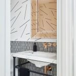 Tiny Vertical Backsplash Tiles, White Upper Wall, Tinted Mirror, White Table Sink, Black Metal Table, White Toilet