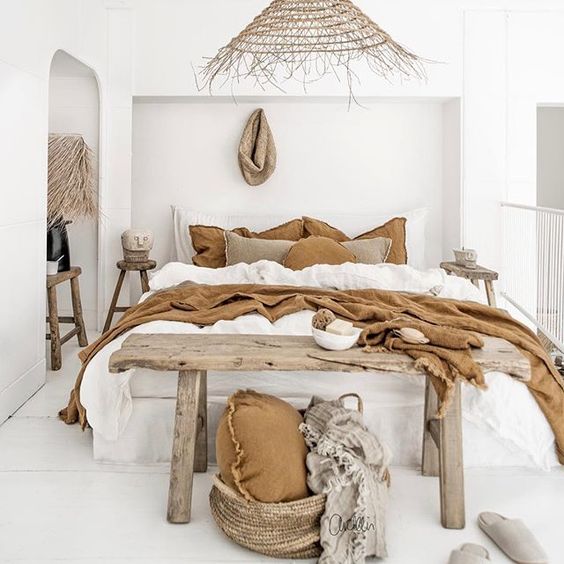 bedroom, white wooden floor, wooden bench, white linen, wall nook, rattan pendant