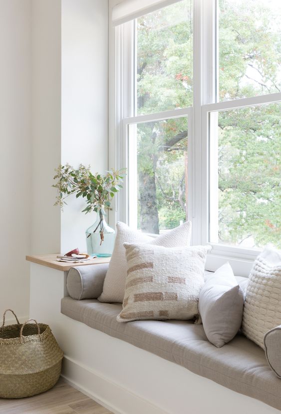 window seat, white built in bench, grey cushion, pillows