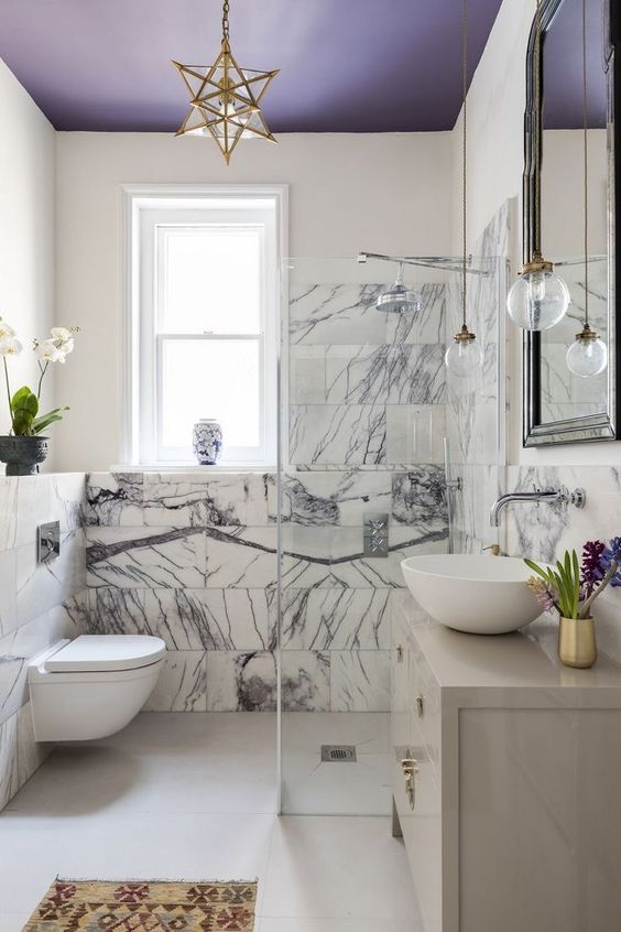 bathroom, white floor, white marble wall, white wall, purple ceiling, star pendant, white cabinet, glass pendant, mirror