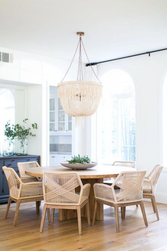 wooden dining set, rattan seat and back, wooden flor, natural chandelier, round wooden table
