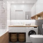 Bathroom, Grey Hexagonal Floor Tiles, White Floating Toilet, White Floating Vanity Wooden Counter Top, White Upper Cabinet, Wooden Looking White Tub