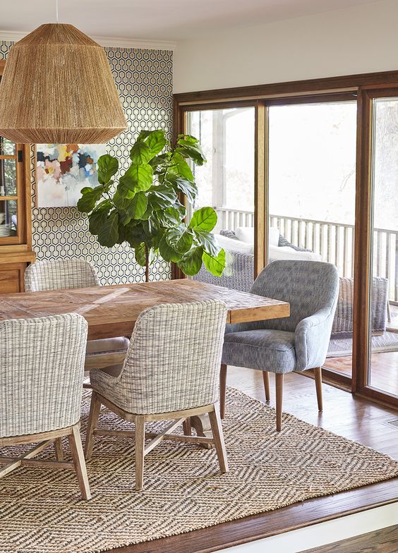 dining room, wooden floor, wooden table, rattan chairs, grey chairs, rattan rug, rattan pendant