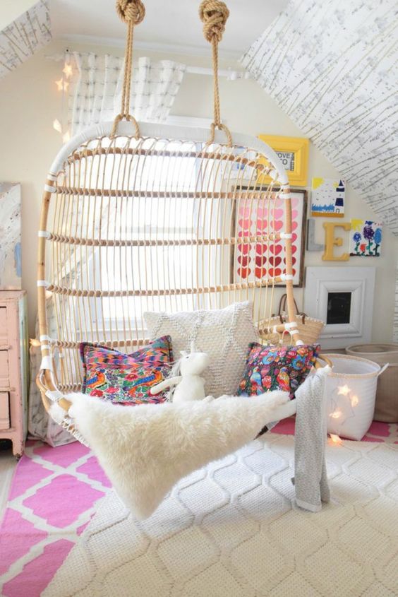rattan swing, bedroom, white pink rug, white wall,