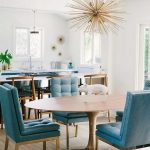 Dining Room, Wooden Floor, Wooden Tulip Table, Blue Tufted Leathered Chairs With Golden Legs