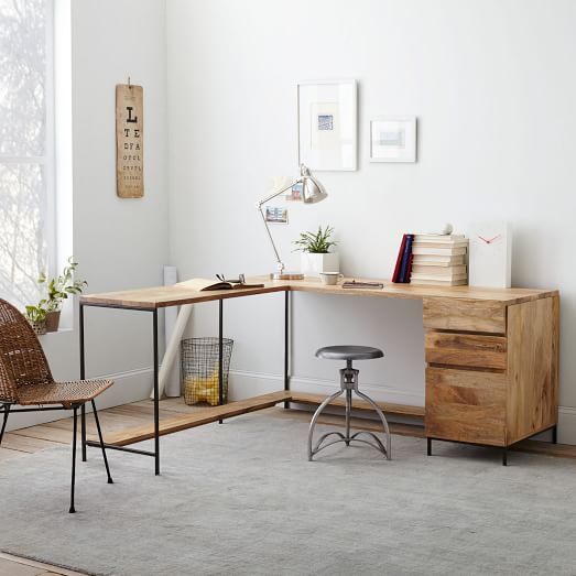 study room, grey floor, white wall, wooden table with drawers, silver table lamp, grey stool, rattan chair