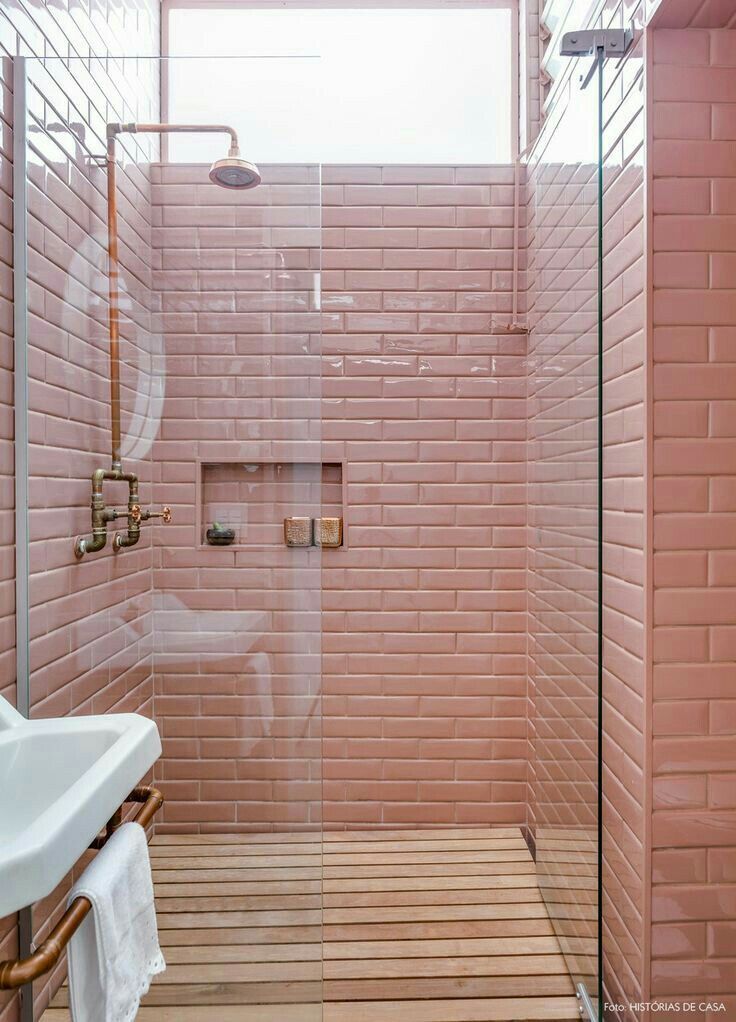 bathroom, wooden floor, pink subway wall tiles, shower, white sink