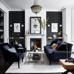 Living Room, Dark Floor, White Rug, Black Wall, White Accent, White Fireplace, Chandelier, Black Sofa, Black Chairs, Coffee Table, Console Table
