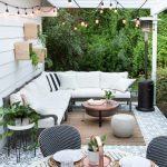 Patio, Patterned Floor, White Wooden Plank, Black Sofa Platform, White Cushion, Round Coffee Table