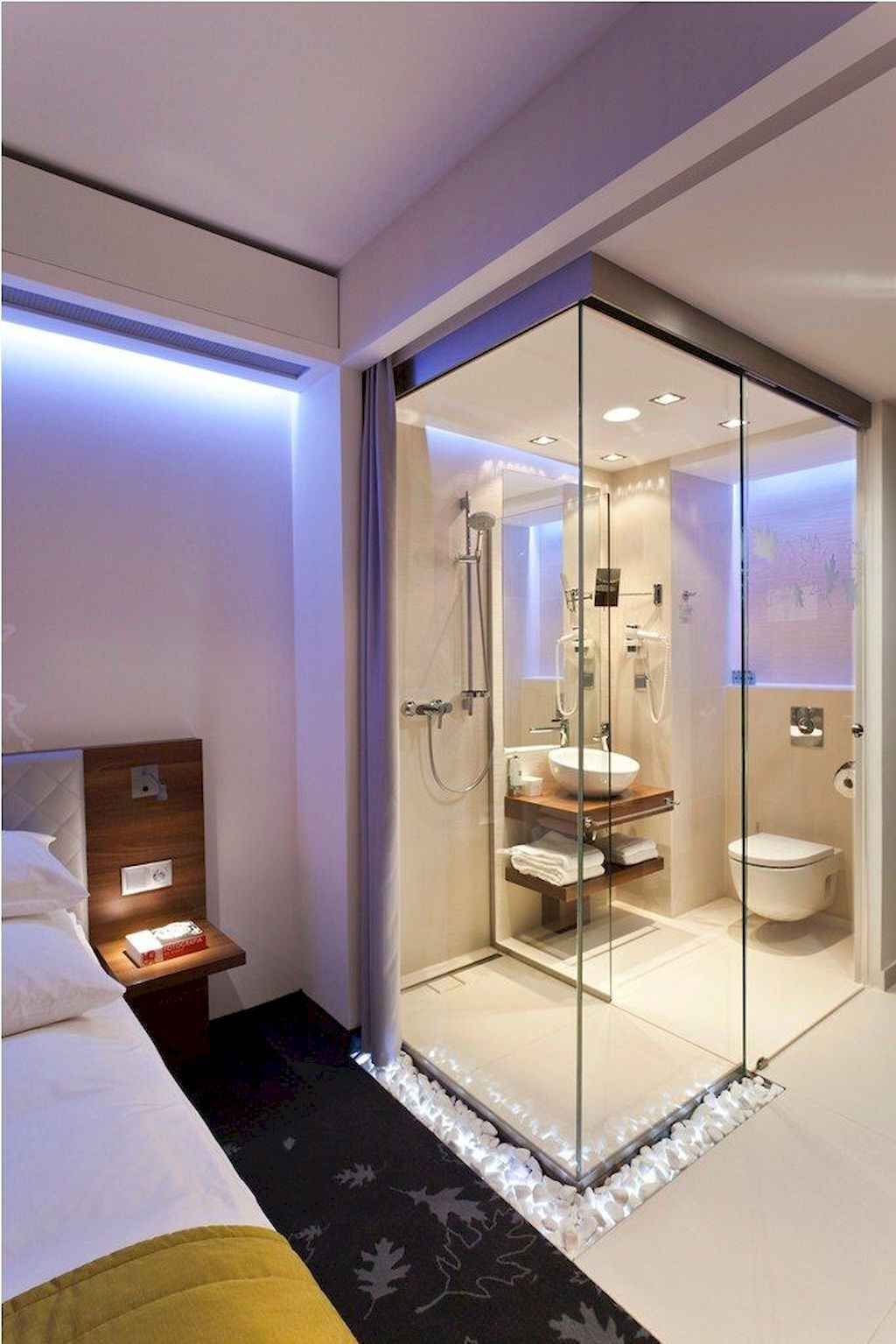 bathroom, white floor, white wall, glass wall, white toilet, white sink, wooden floating shelves