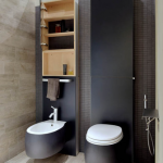 White Grey Floating Toilet, Matching Sink, Black Accent Wall, Black Accent Shelves