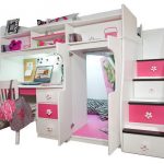 white fuschia wooden loft bed with a desk, a built in dresser, a stairway unit that features shelving on the side, drawers built into the stairs and slip resistant treads