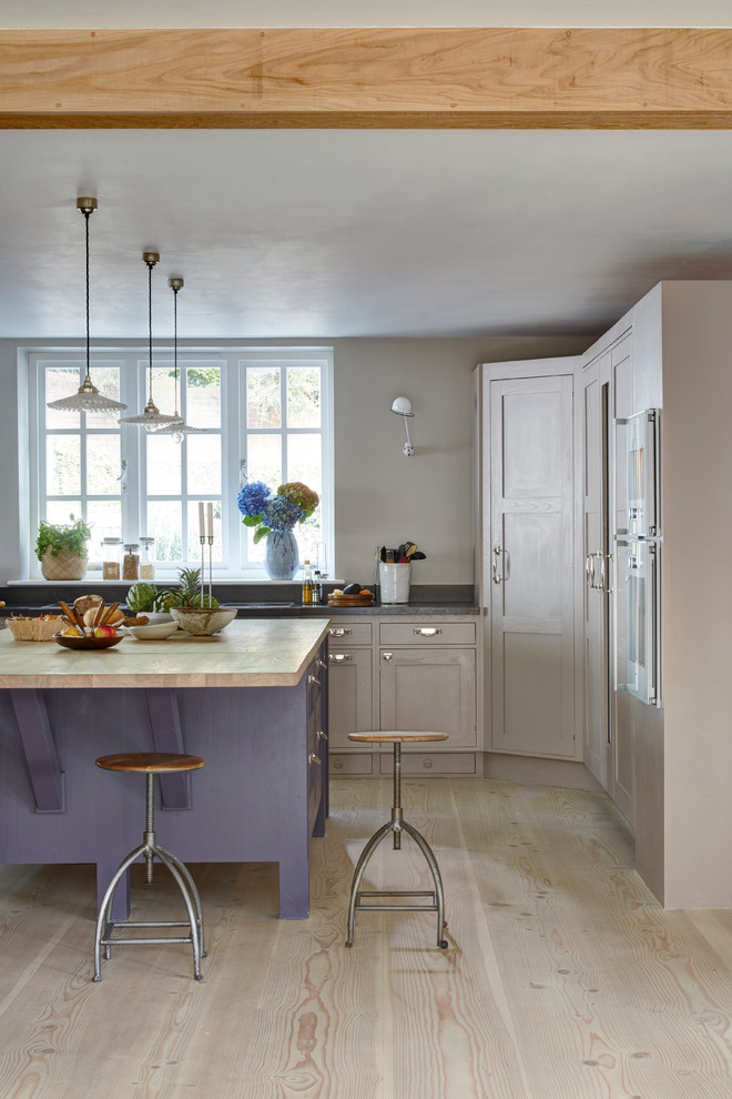 farmhouse kitchen remodel with beige cabinets and walk in closet purple kitchen island with hardwood top round top stools