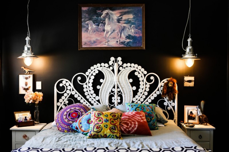 ornate bedroom furniture bed throw pillows cabinets drawers wall paintings hanging lamps eclectic design