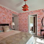 asian themed bedroom mandarin lantern pink painted wall with pink bamboo and birds pattern oval mirror mirrored door black table and chair