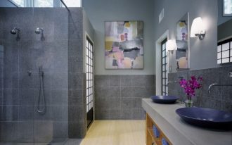 bamboo bathroom bamboo floor concrete walls windows shower glass door vanity blue sink bowls faucets mirror wall sconces artwork