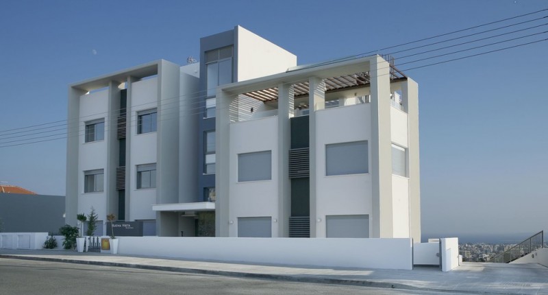 modern mansion exterior flat mansion and roofs frosted glass windows dark accent walls white and grey painted building