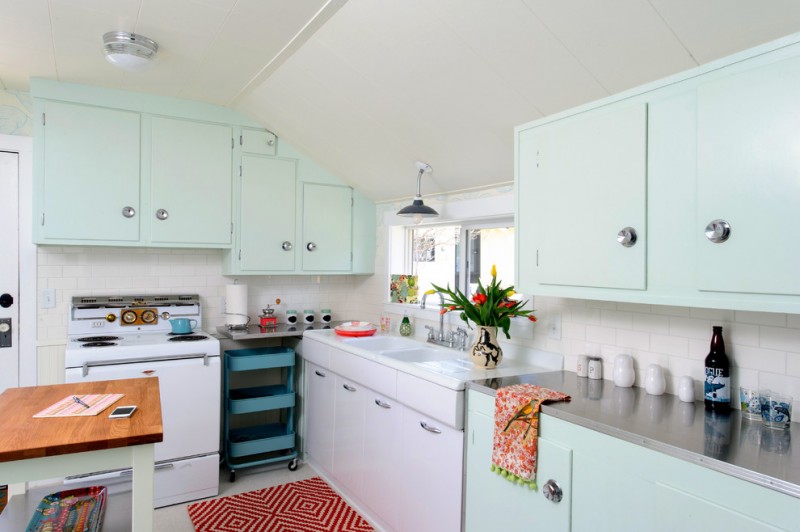 pastel kitchen baby blue and cabinets small patterned rug windows wall sconce blue rack gray countertop undermount sink