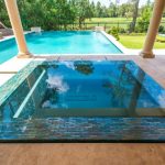Rectangular Pool Spa Hot Tub Mosaic Tiled Line Granite Floor Patio Pool Seating Backyard