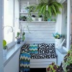 Small Sunroom With White Wooden Walls, Small White Wooden Bench, White Wooden Shelves, Plants